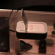 Illustration for article titled Splashpower Charger Lets You Charge Wirelessly, Lose That Wired Mess